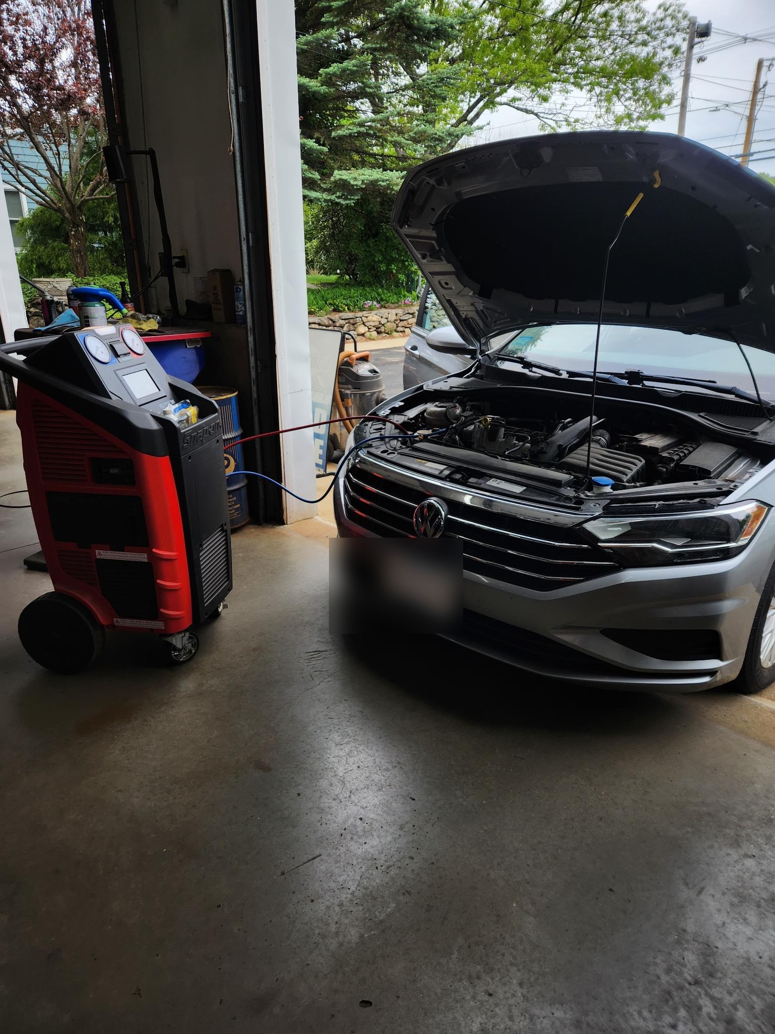 A/C system recharge on VW Jetta at Akin Automotive